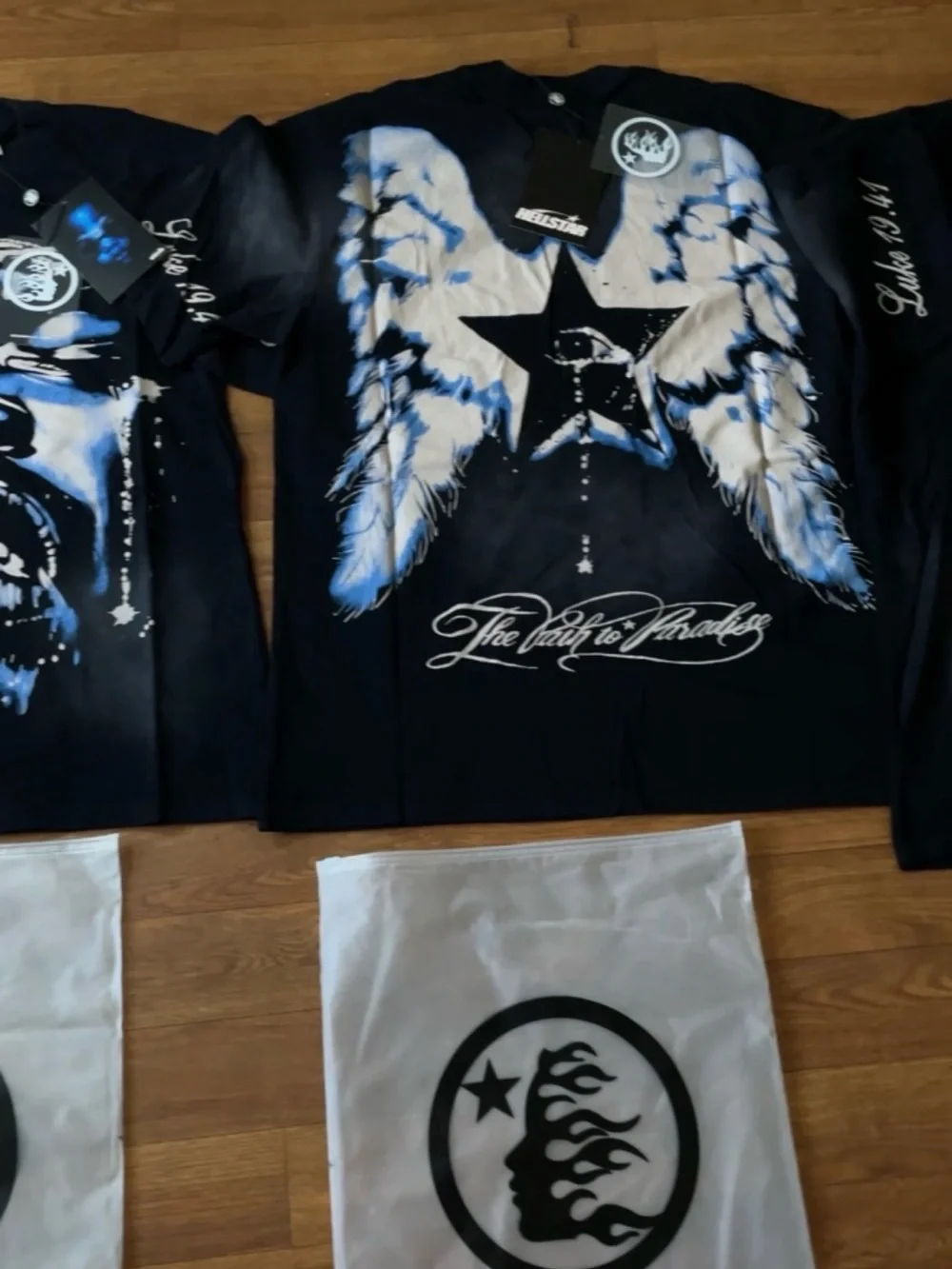 Hellstar Men’s Black Graphic Tee with Blue Face Print